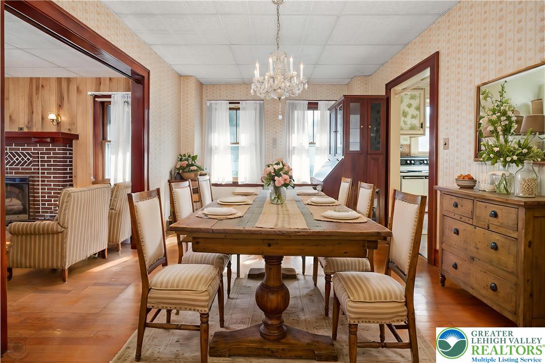 2730 Farmersville Road Bethlehem, PA 18020 - Photo 12 of 24 a view of a a dining room with furniture window and wooden floor