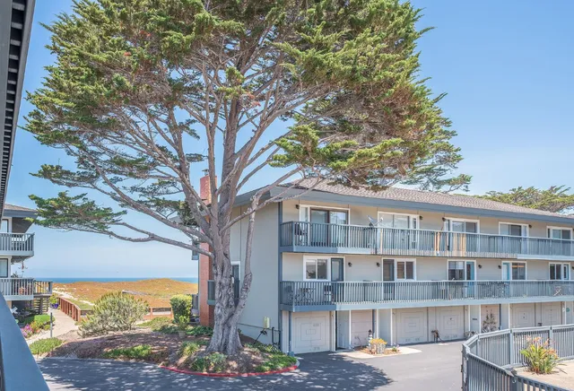 a view of an ocean and mountain