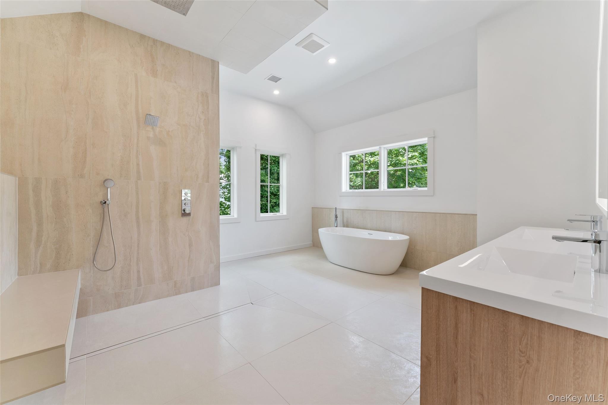 101 Carthage Road Scarsdale, NY 10583 - Photo 21 of 35 a bathroom with a tub shower and window