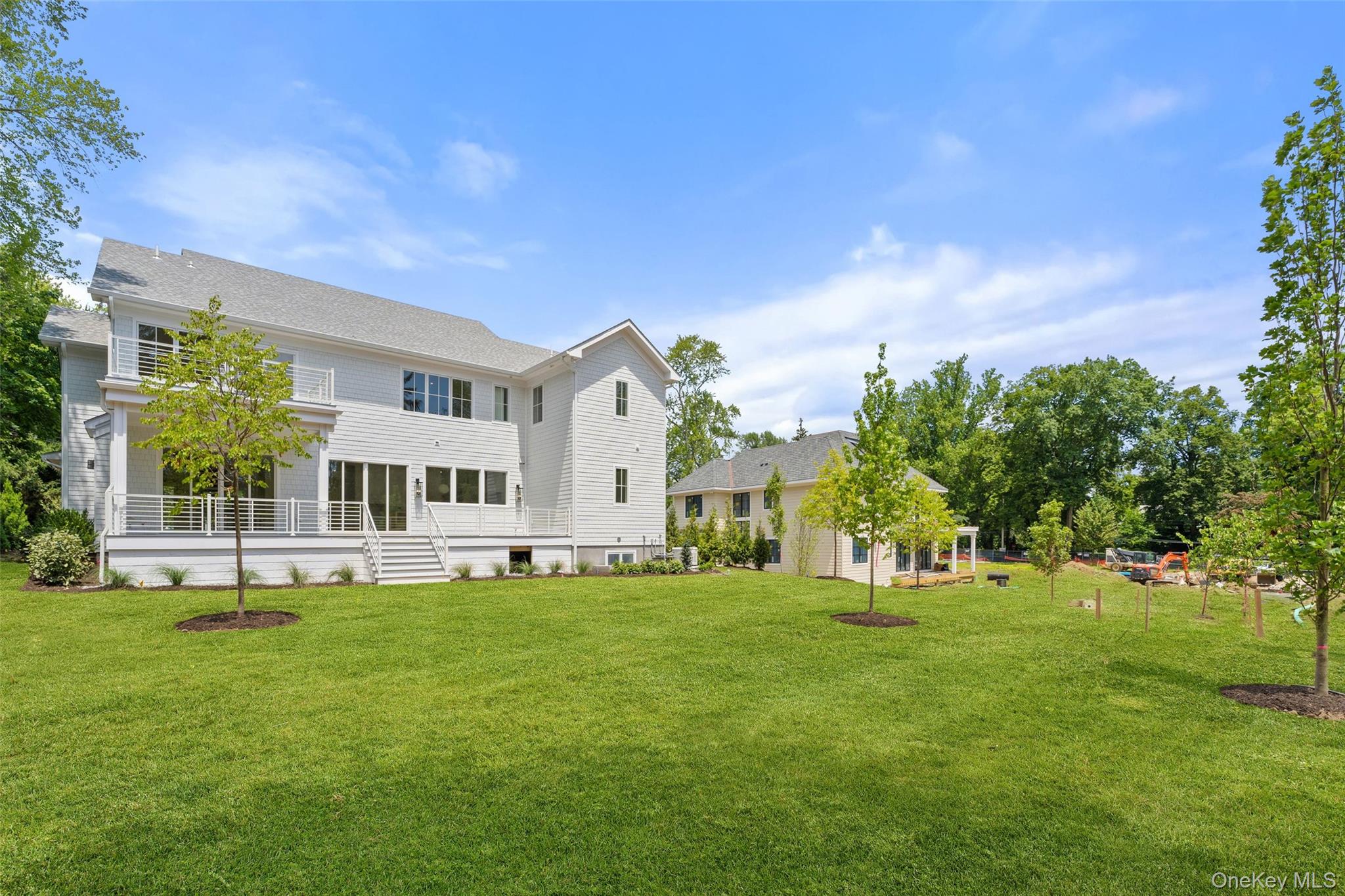 101 Carthage Road Scarsdale, NY 10583 - Photo 31 of 35 a view of a house with a big yard and large trees