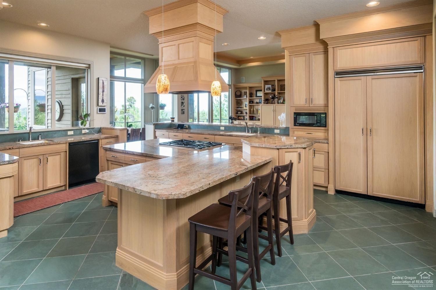 3155 Northwest Metke Place Bend, OR 97703 - Photo 11 of 22 Kitchen with slab granite countertops, 2