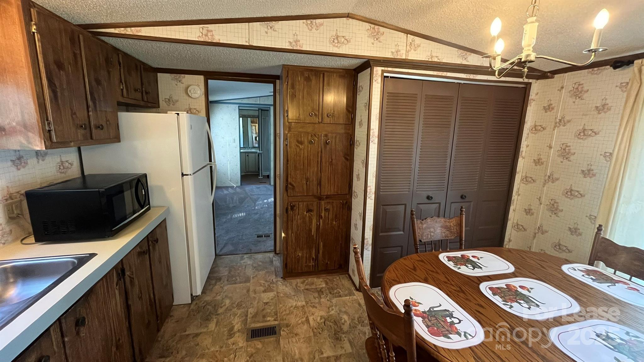 4232 Sunrise Drive Kannapolis, NC 28083 - Photo 6 of 8 a bathroom with a sink a toilet and shower