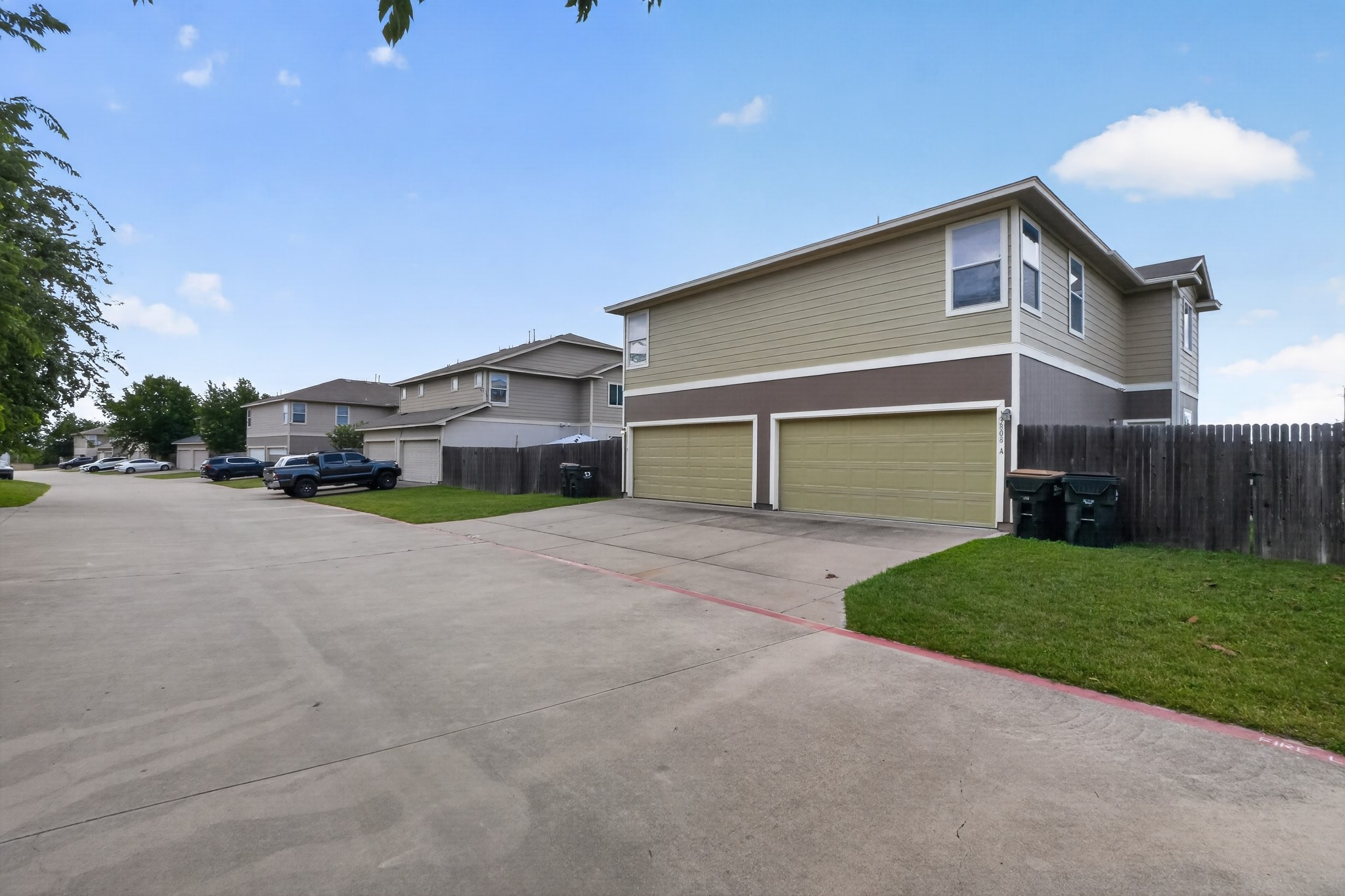13808 Harris Ridge Boulevard Pflugerville, TX 78660 - Photo 8 of 40 a front view of a house with a yard and garage