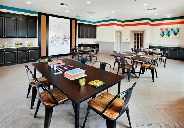 a view of a dining room with furniture