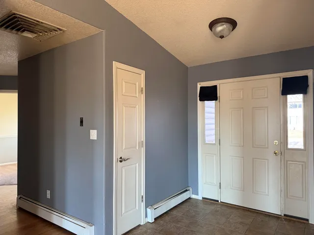 an empty room with windows