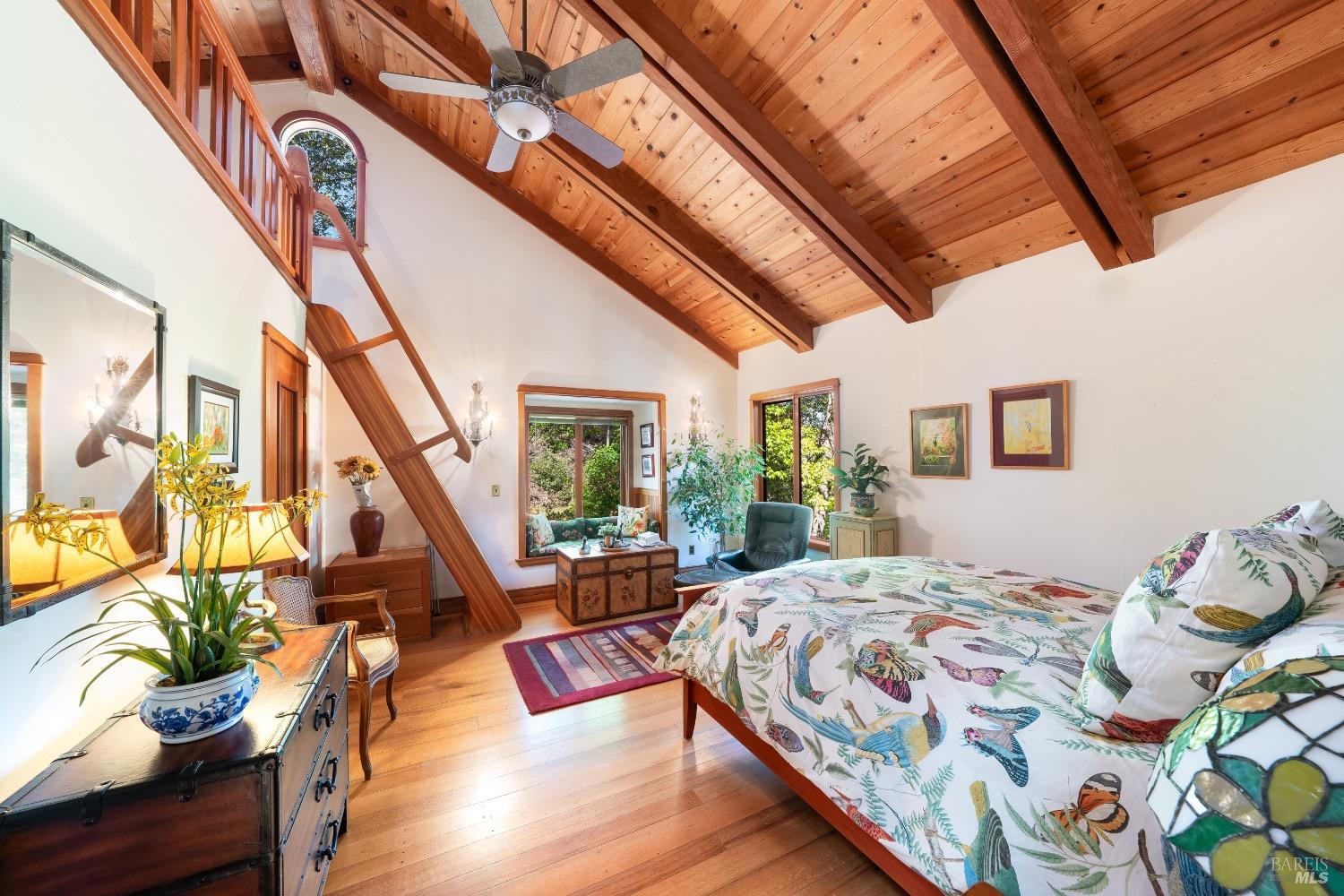 4034 Spring Mountain Road St. Helena, CA 94574 - Photo 13 of 36 a bedroom with a bed a couch and a potted plant