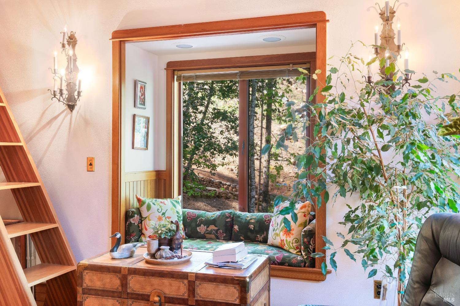 4034 Spring Mountain Road St. Helena, CA 94574 - Photo 16 of 36 a living room with furniture and a window