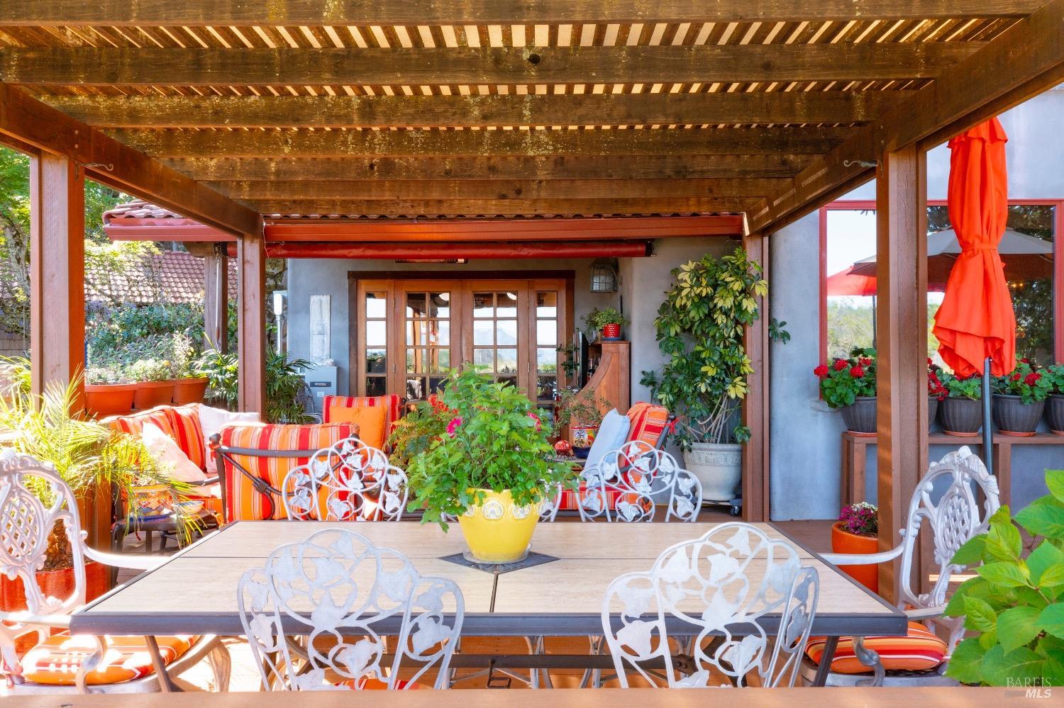 4034 Spring Mountain Road St. Helena, CA 94574 - Photo 22 of 36 a outdoor living space with patio furniture and potted plants
