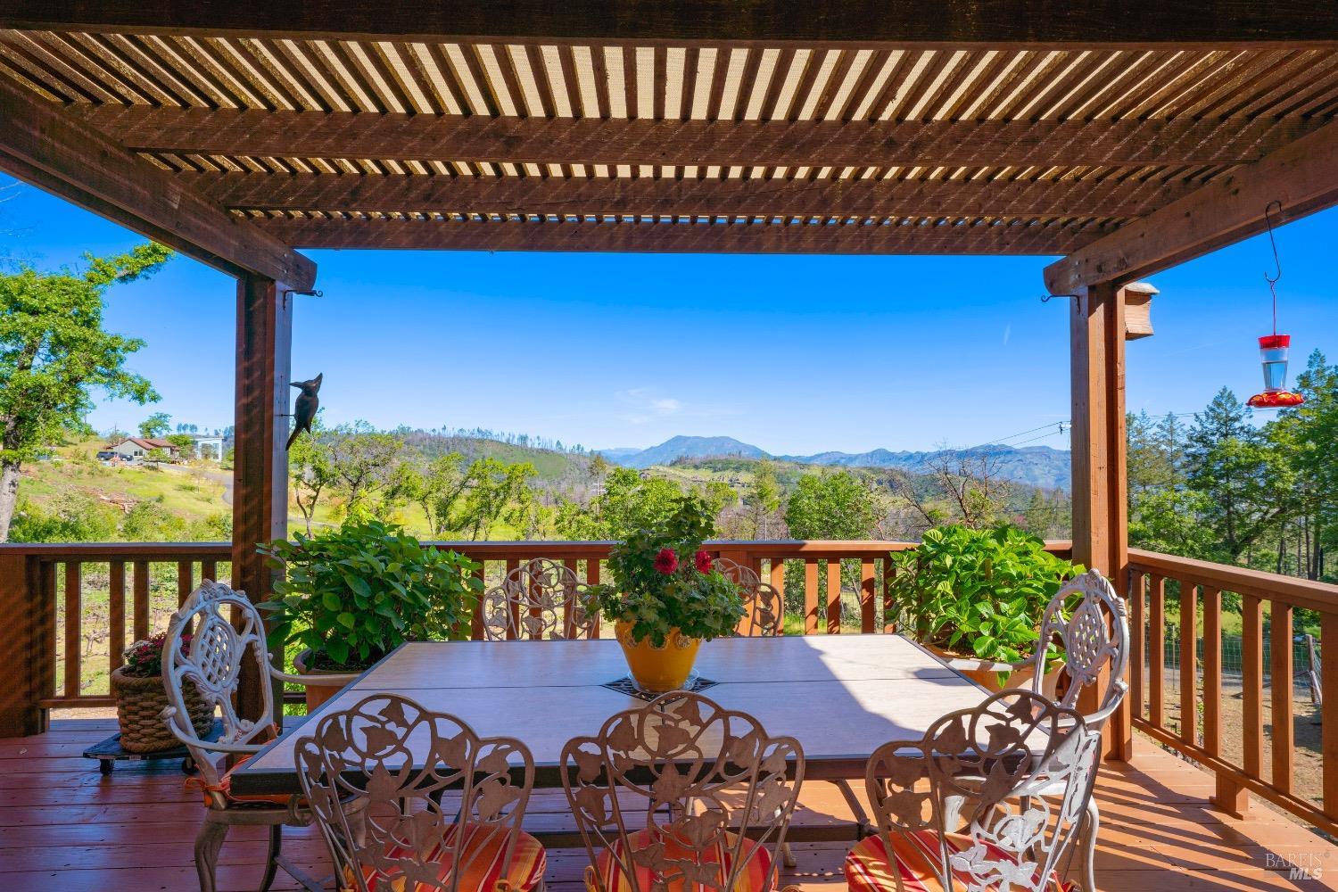 4034 Spring Mountain Road St. Helena, CA 94574 - Photo 25 of 36 a view of a chairs and table in patio with a swimming pool