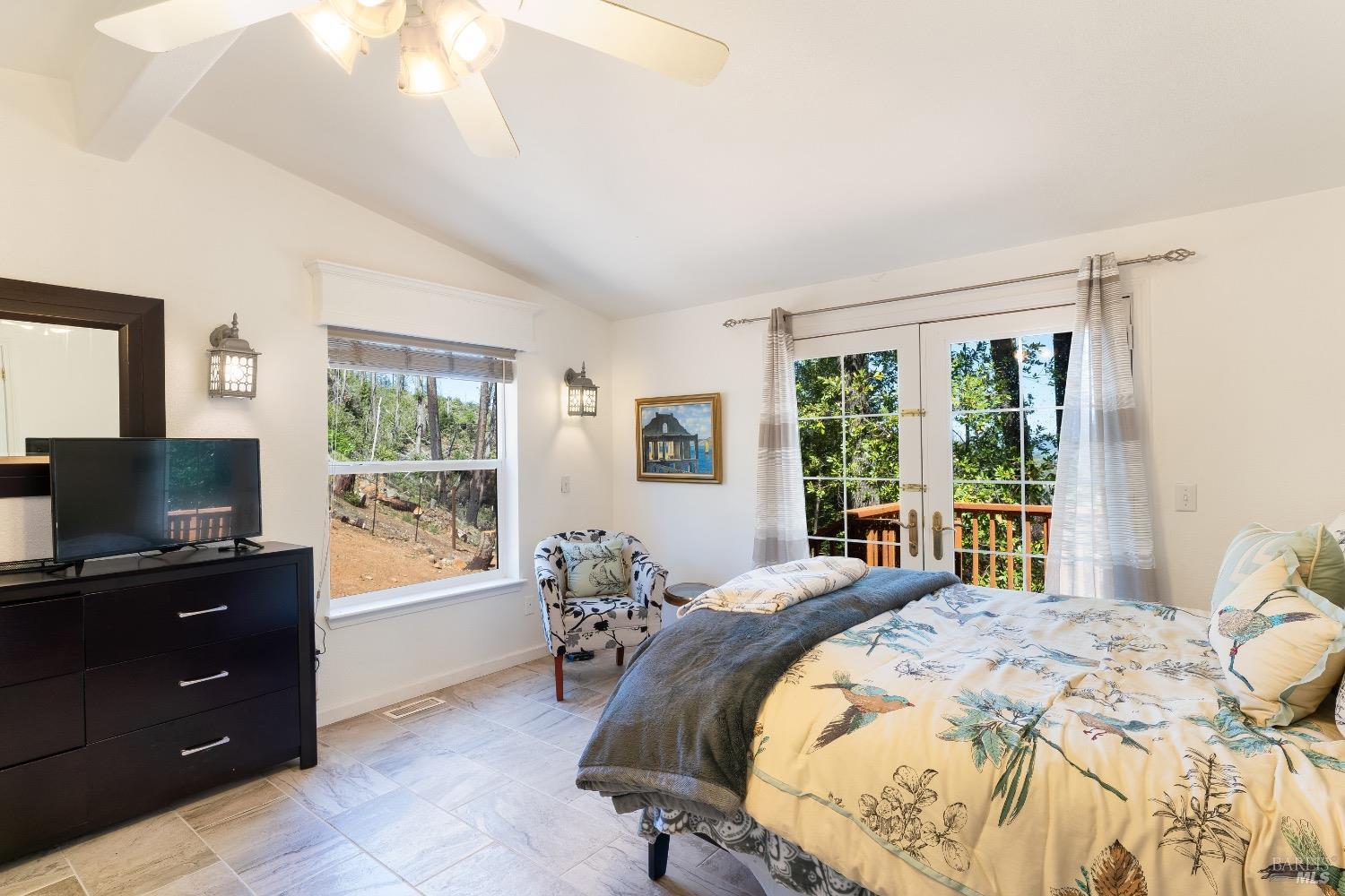 4034 Spring Mountain Road St. Helena, CA 94574 - Photo 35 of 36 a bed sitting in a bedroom next to a window