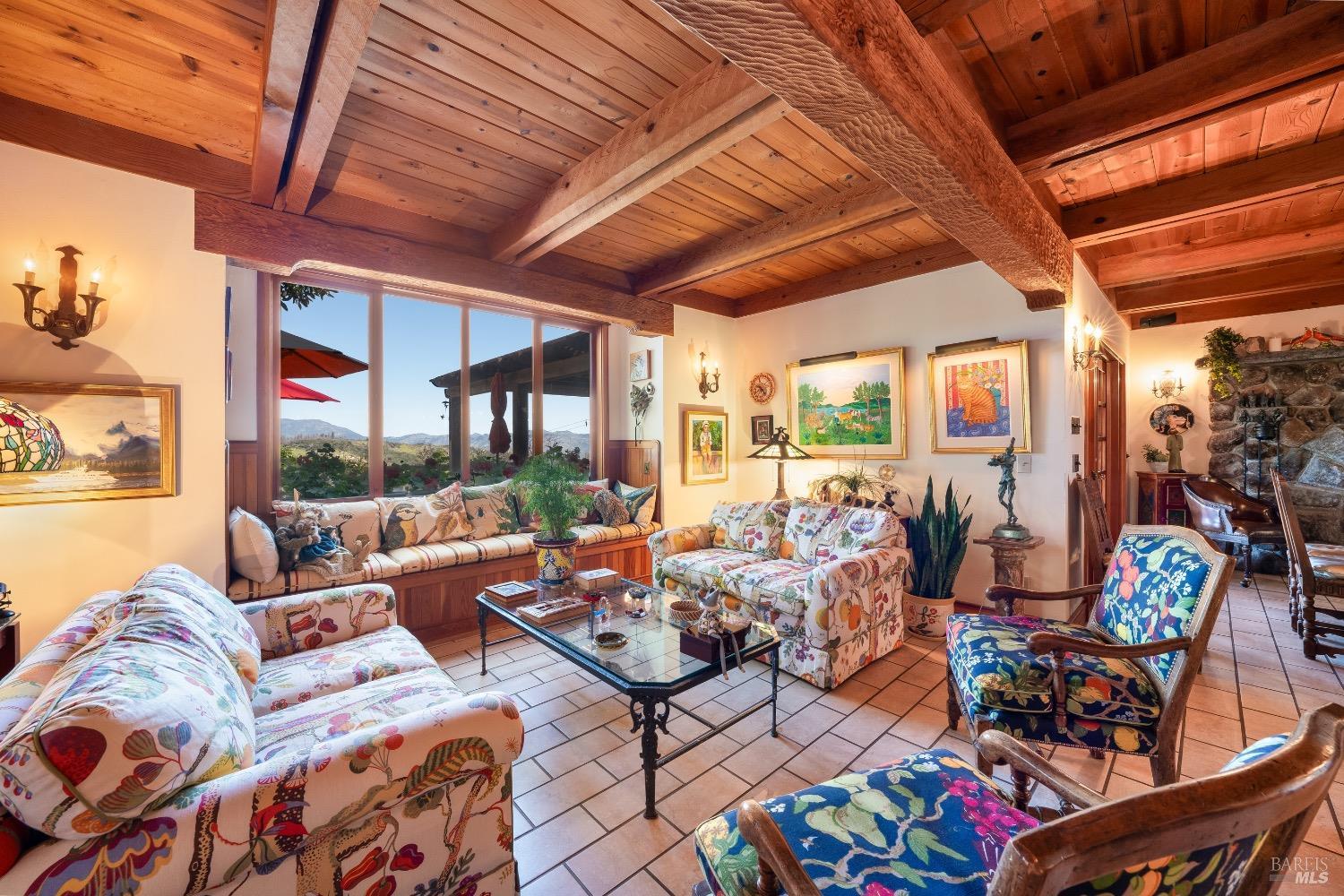4034 Spring Mountain Road St. Helena, CA 94574 - Photo 7 of 36 a living room with furniture and a floor to ceiling window