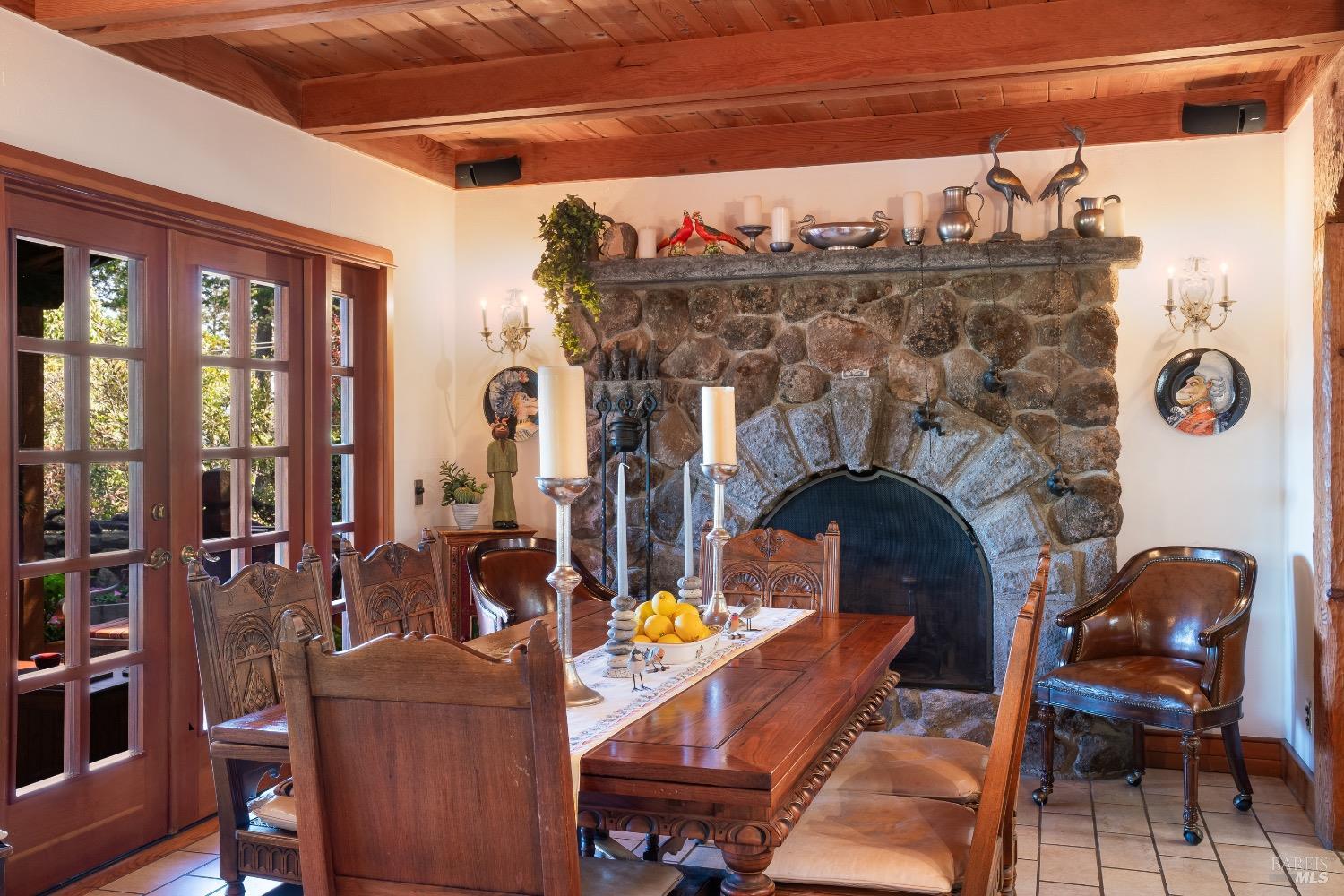 4034 Spring Mountain Road St. Helena, CA 94574 - Photo 9 of 36 a living room with furniture and a fireplace