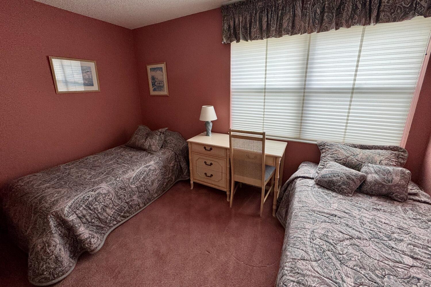 3991 Southwest Greenwood Way, Unit I Palm City, FL 34990 - Photo 15 of 15 a bedroom with a bed and a window