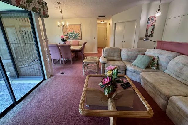 a room with furniture and a wooden floor