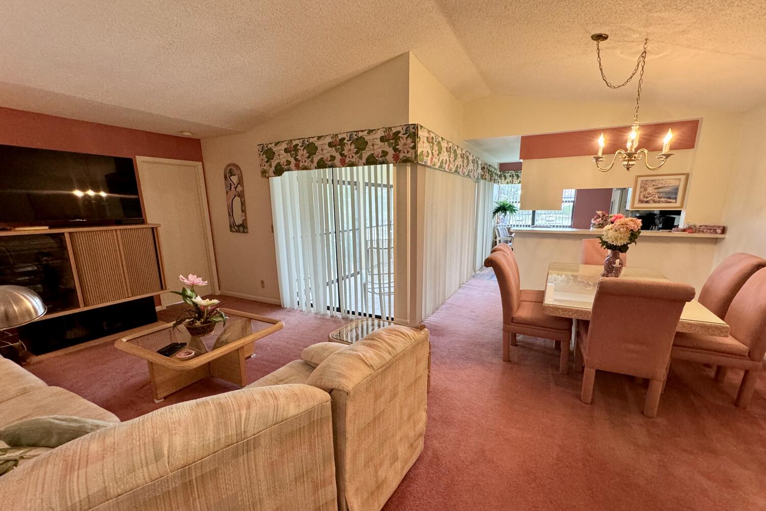 3991 Southwest Greenwood Way, Unit I Palm City, FL 34990 - Photo 6 of 15 a living room with furniture and a flat screen tv