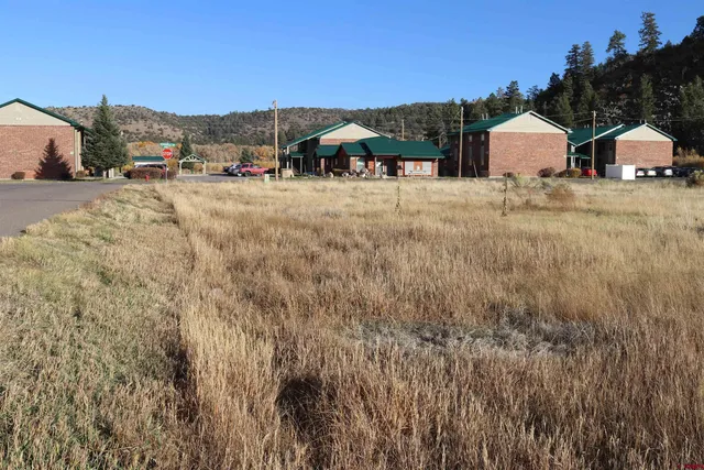 a view of outdoor space with wooden fence