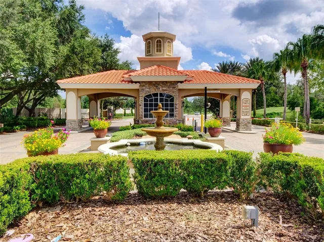 a front view of a building with garden