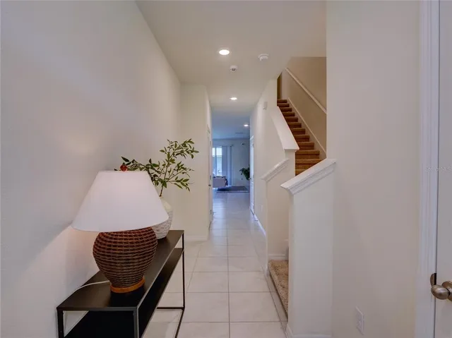 a hallway with sitting area