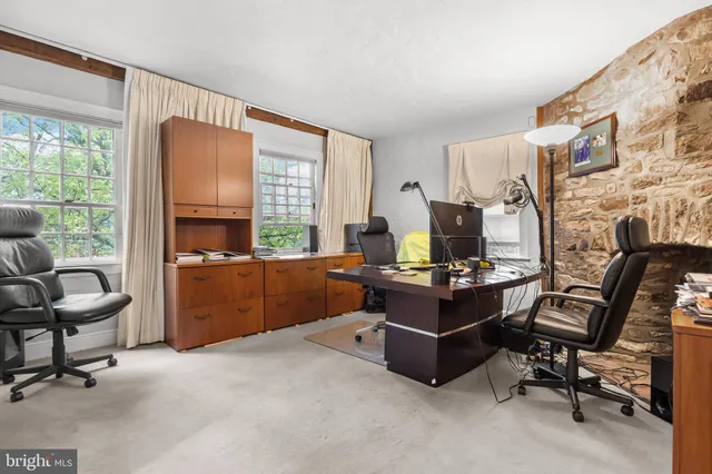 a room with furniture and a window