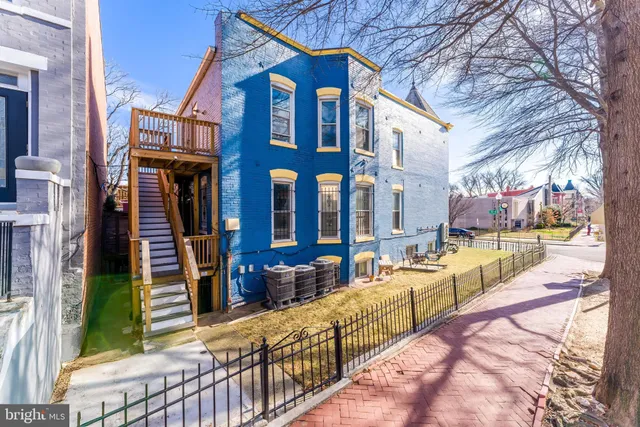 a view of a house with a swimming pool
