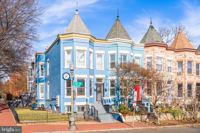 a front view of a building with street view