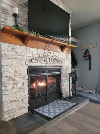 a living room with furniture window and wooden floor