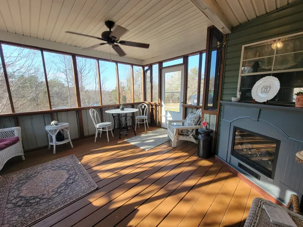 a spacious bathroom with a double vanity sink a mirror and a bathtub