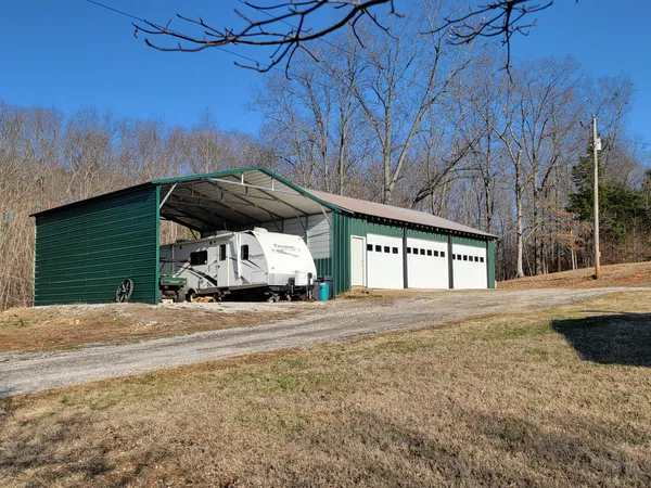 a view of street with parked cars