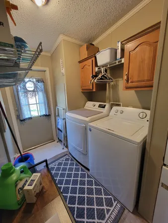 a bed room with furniture and a window