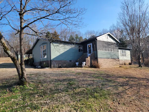 a view of street view with large trees