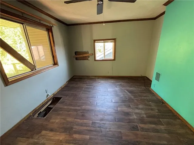 an empty room with windows