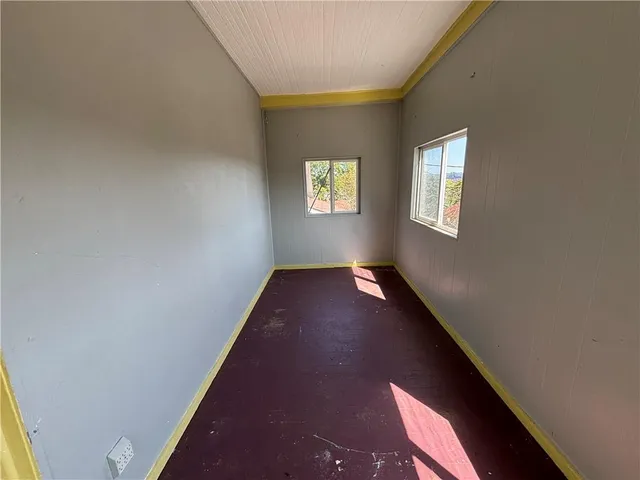 a bathroom with a toilet and a bathtub