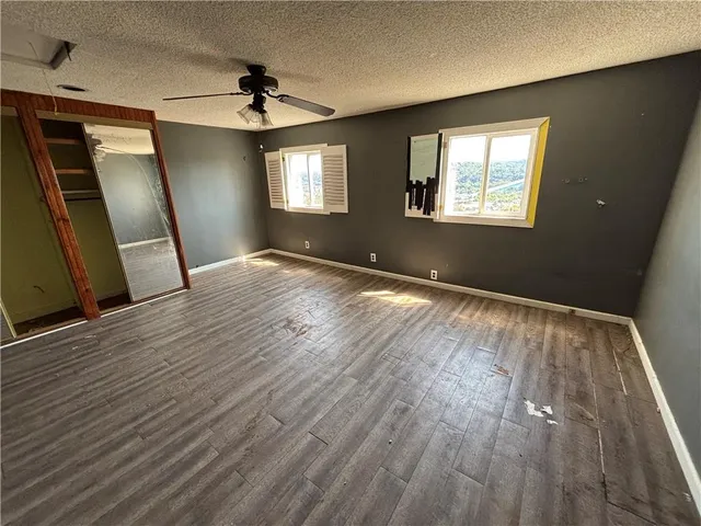 a view of a livingroom with a staircase