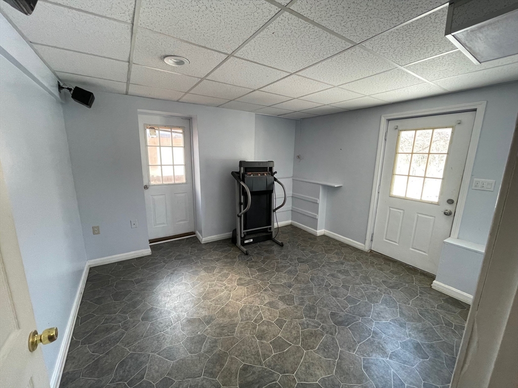35 Ellis Road Southbridge, MA 01550 - Photo 17 of 29 a view of a big room with windows and cabinet