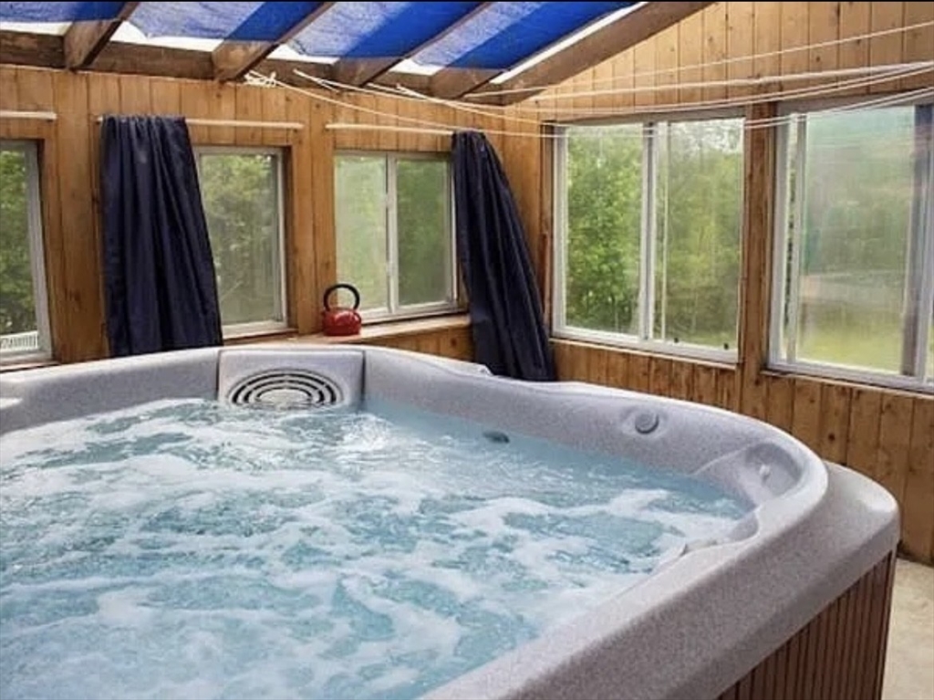 35 Ellis Road Southbridge, MA 01550 - Photo 18 of 29 a view of a backyard with a tub and window
