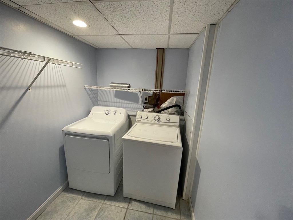 35 Ellis Road Southbridge, MA 01550 - Photo 21 of 29 a utility room with dryer and washer