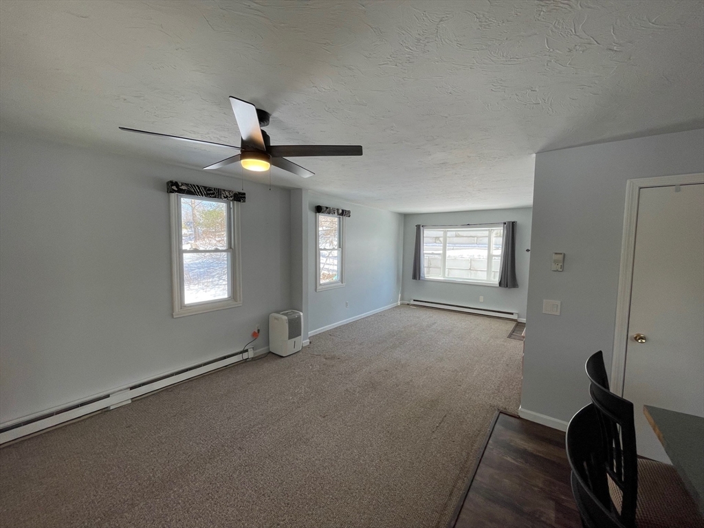 35 Ellis Road Southbridge, MA 01550 - Photo 4 of 29 a view of an empty room with a window