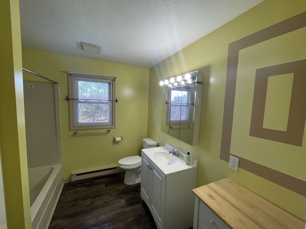 35 Ellis Road Southbridge, MA 01550 - Photo 10 of 29 a bathroom with a sink and a toilet