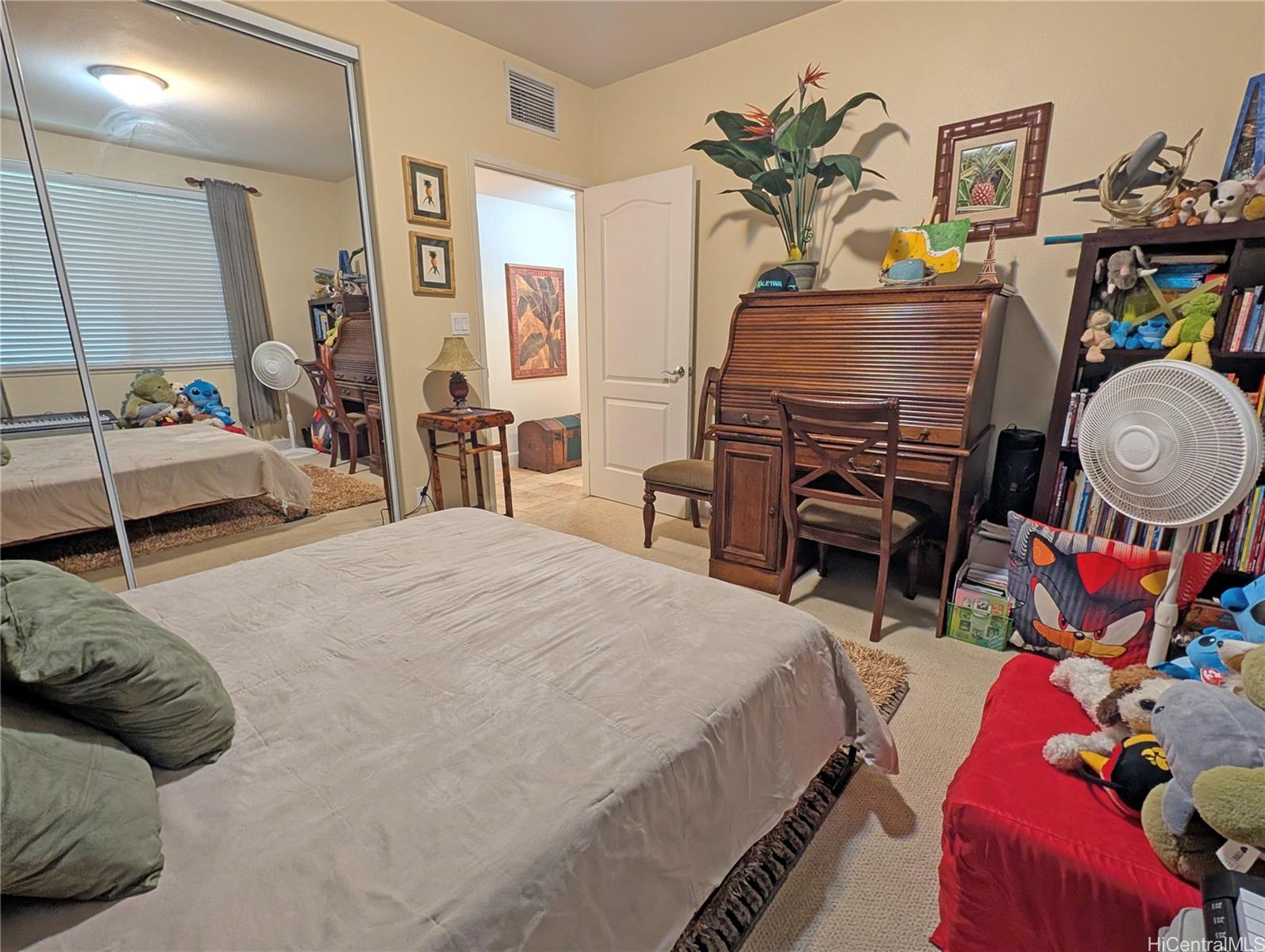 92-1057 Koio Drive, Unit F Kapolei, HI 96707 - Photo 12 of 18 Second Bedroom with Murphy Bed