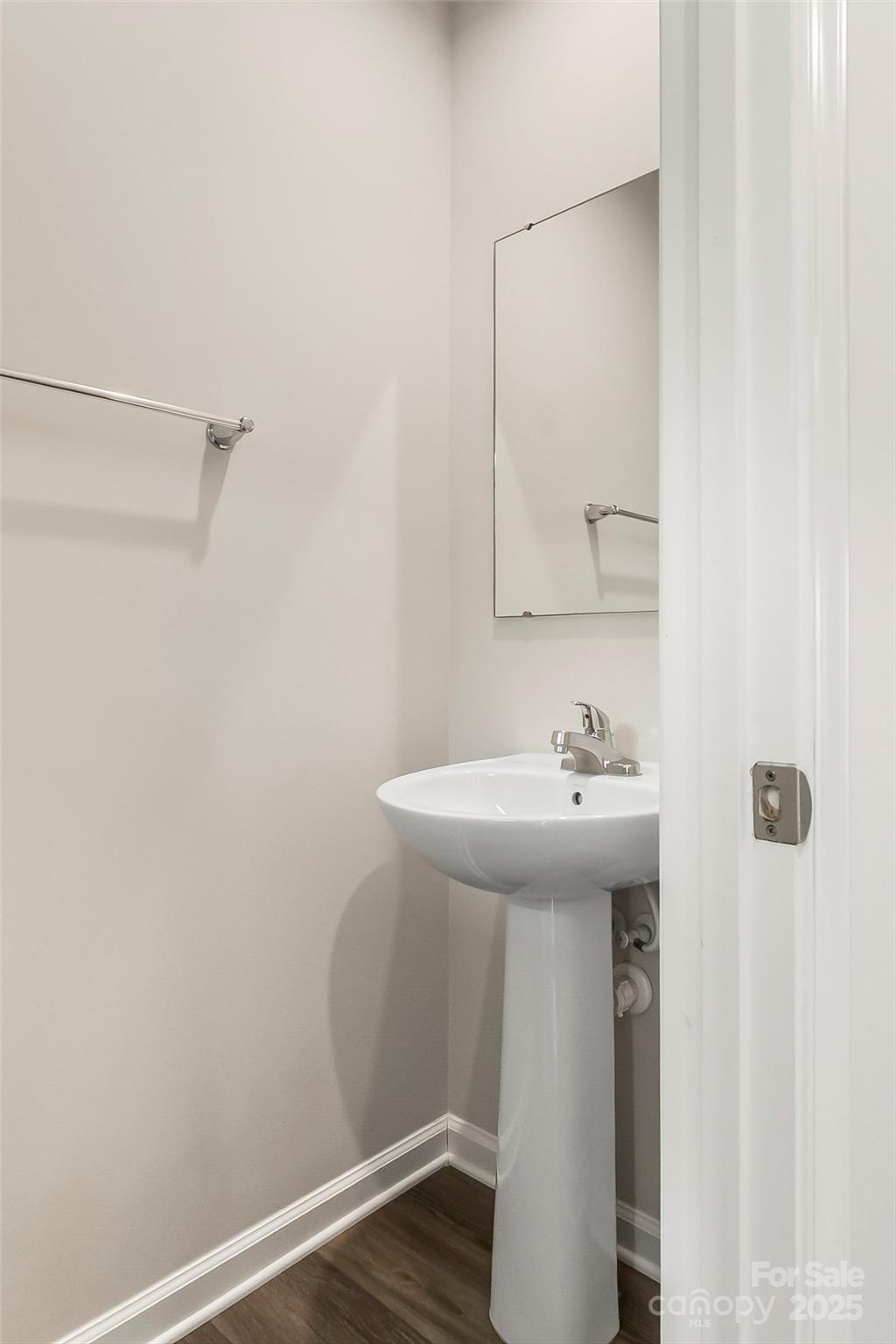1530 39th Ave Loop Northeast, Unit 3 Hickory, NC 28601 - Photo 23 of 32 a bathroom with a sink and a mirror