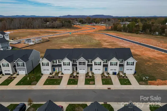 a view of a street with houses
