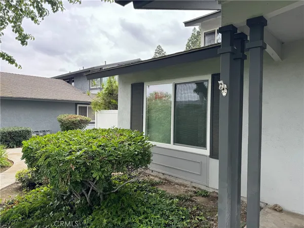 front view of a house with a small yard