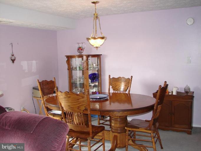 999 Heather Ridge Drive, Unit E Frederick, MD 21702 - Photo 5 of 7 Dining Area