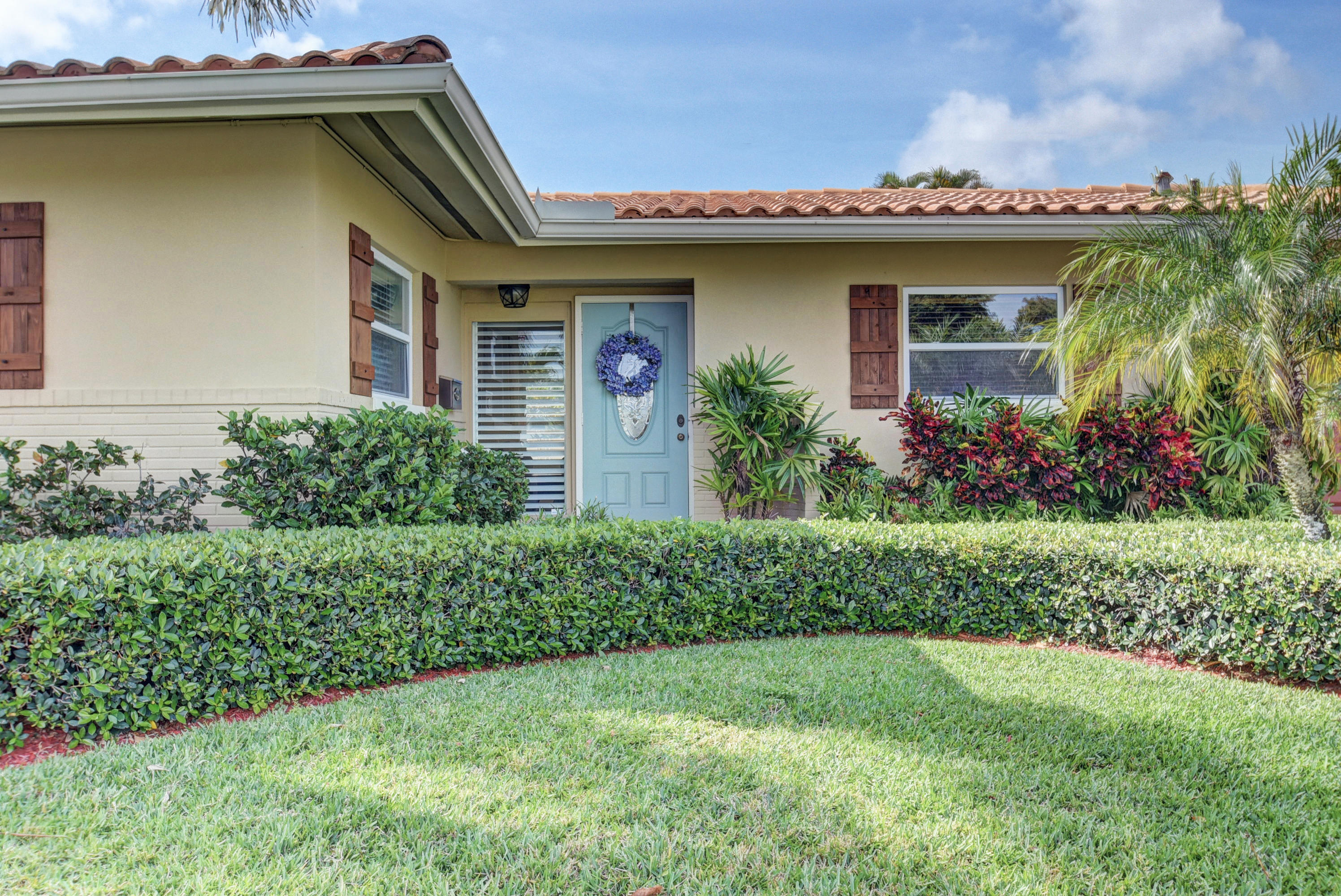 1380 Southwest 5th Street Boca Raton, FL 33486 - Photo 3 of 33 Beautifully maintained lawn