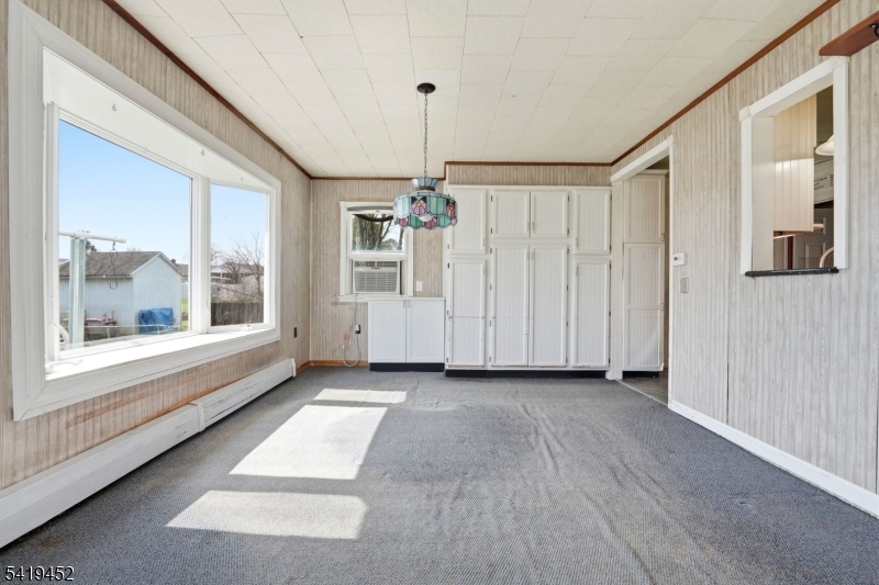808 Charles Road Phillipsburg, NJ 08865 - Photo 15 of 33 a view of a room with a window and hardwood floor