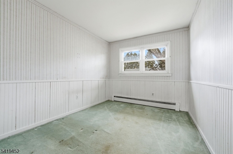 808 Charles Road Phillipsburg, NJ 08865 - Photo 21 of 33 an empty room with a empty space and window
