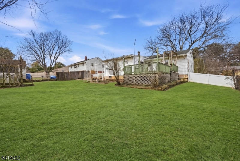 808 Charles Road Phillipsburg, NJ 08865 - Photo 27 of 33 a view of a white house with a big yard and large trees