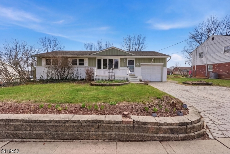 808 Charles Road Phillipsburg, NJ 08865 - Photo 3 of 33 a front view of a house with a yard