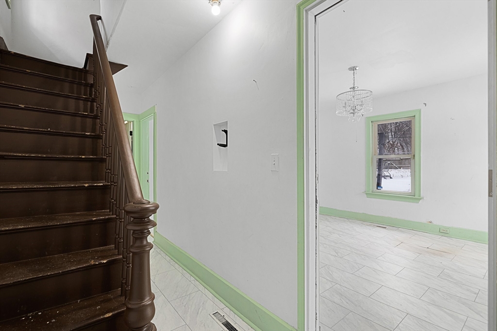 3 Ely Street Worcester, MA 01610 - Photo 3 of 17 a view of hallway with stairs