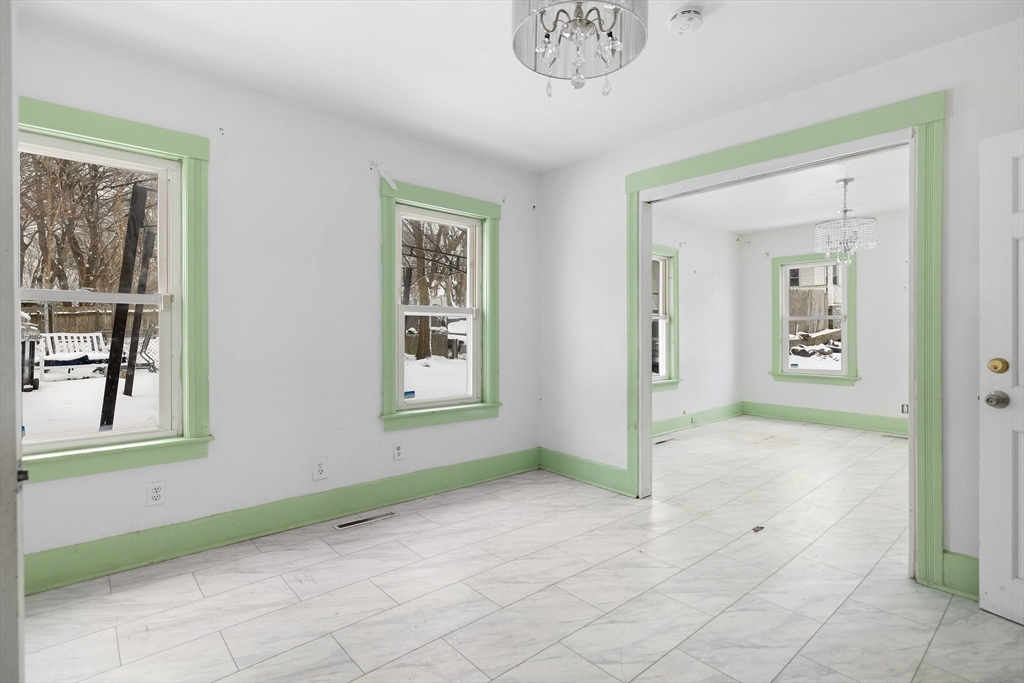 3 Ely Street Worcester, MA 01610 - Photo 6 of 17 a view of an empty room with window